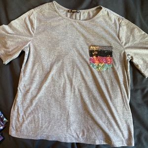 Casual Tee with sequin pocket